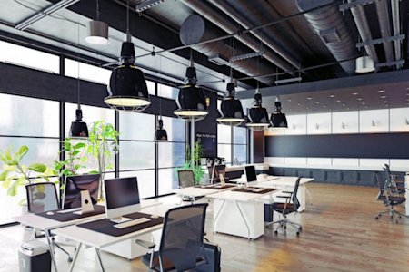 Empty IT workstations indicating a shortage of staff