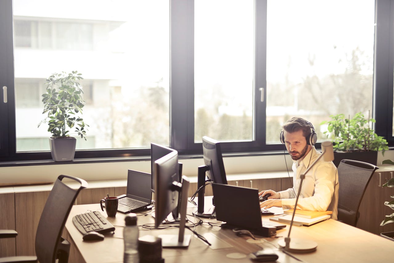 An IT manager working at his computer.