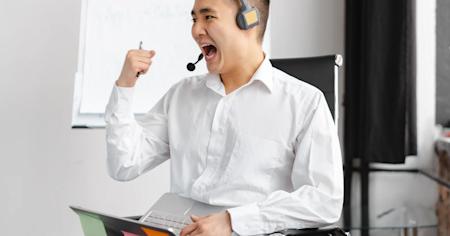 A happy IT technician using Splashtop Enterprise to provide remote IT assistance to an end user.