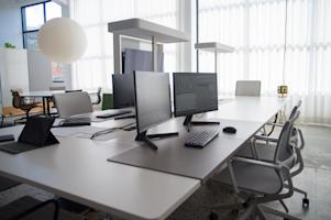 Computers in an office space.