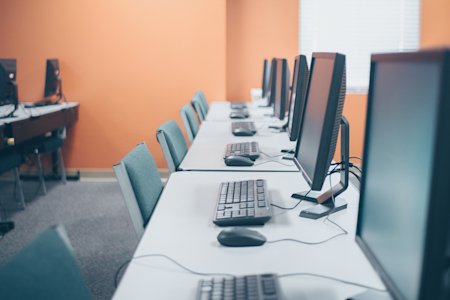 Desktop computers in an office, connected to a remote desktop gateway.