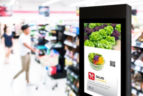 Large touchscreen device in grocery store using wireless screen mirroring technology