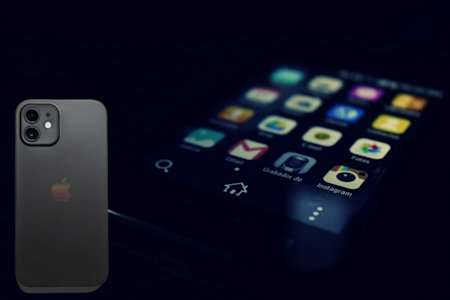 An Android phone and an iPhone, connected via remote access software.