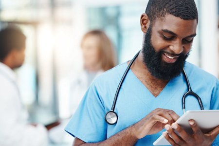 Nurse remotely monitoring patients' vitals with Splashtop