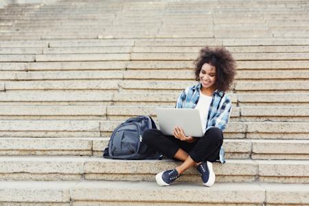 Lady remotely accessing her school computer