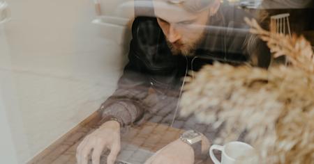 A man using Splashtop on his laptop to work remotely.