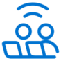 Blue icon showing two stylized people sitting next to each other, with curved lines above them resembling a wireless signal, on a light gray background.