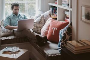 An accountant using remote desktop software to work from home.