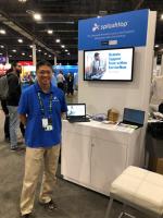 Splashtop representative at trade show booth featuring Remote Support solutions