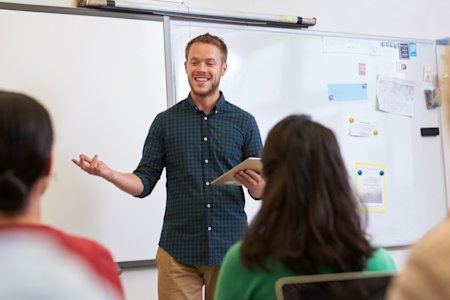 Teacher in classroom demonstrating Splashtop and how it works