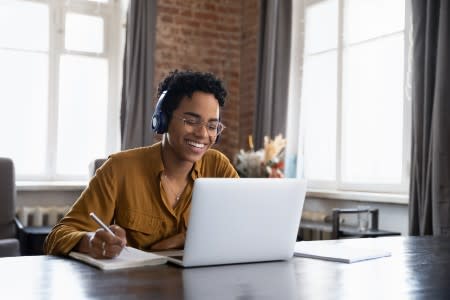 IT professional examining a case study on Splashtop's support for Home Farm Family Medicine