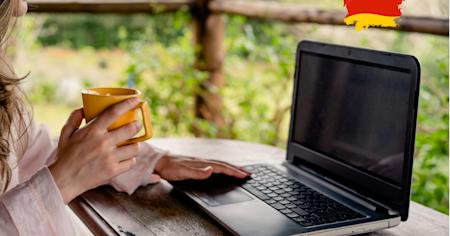 A German woman working remotely, using remote access software.