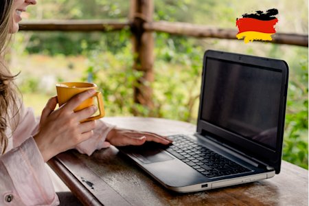 A German woman working remotely, using remote access software.