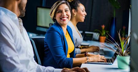 Happy computer users in an office