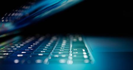 A laptop keyboard and screen.