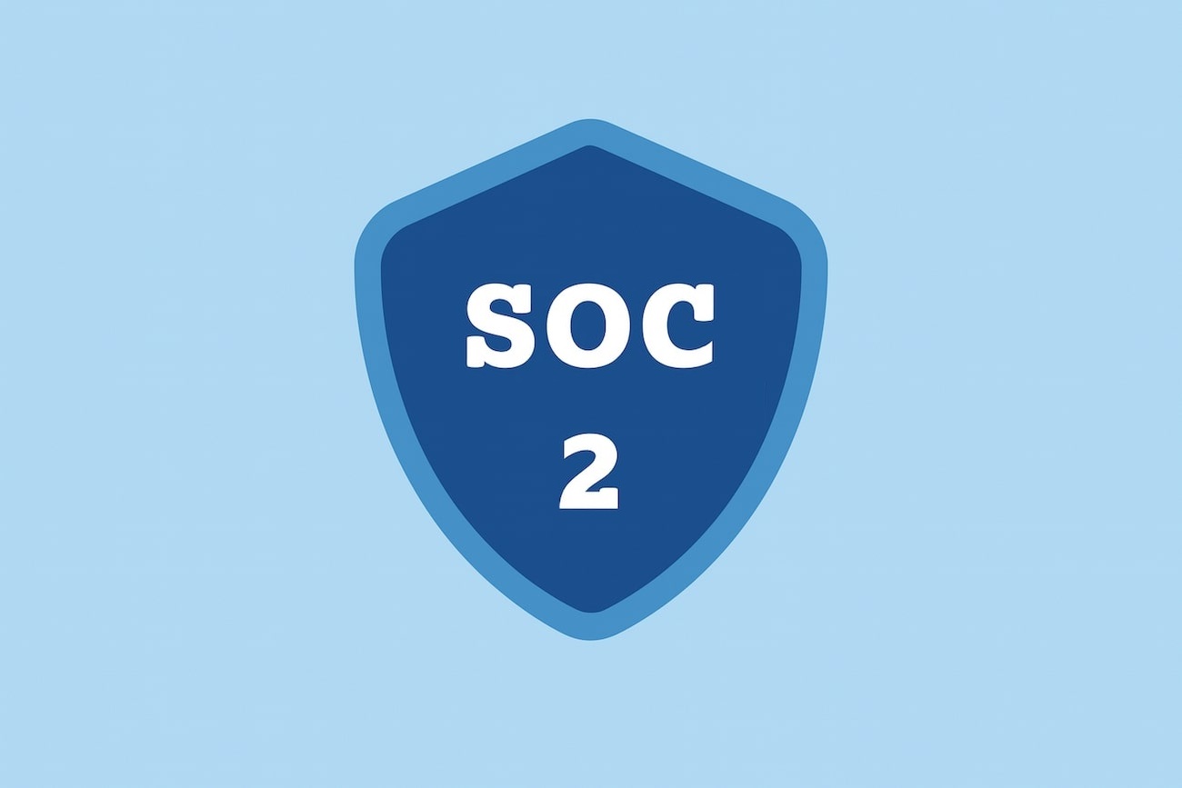 A dark blue shield with a lighter blue border displays the text SOC 2 in white, set against a light blue background.