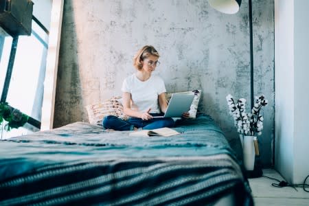 Woman working from home on her computer using Splashtop remote computer access