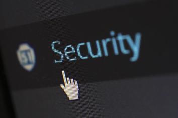 The word "Security" on a computer screen with a mouse icon over it