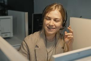 An IT technician using remote support software.