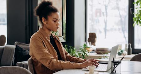 A woman using her laptop.