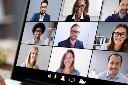 Team members leveraging a live video conference while working remotely