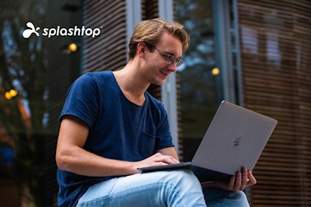 Man Working Remotely Using Splashtop, With Logo Visible