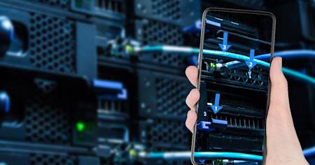 IT Professional using AR technology to troubleshoot with mobile device