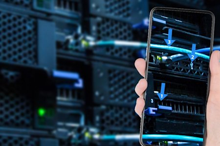 IT Professional using AR technology to troubleshoot with mobile device