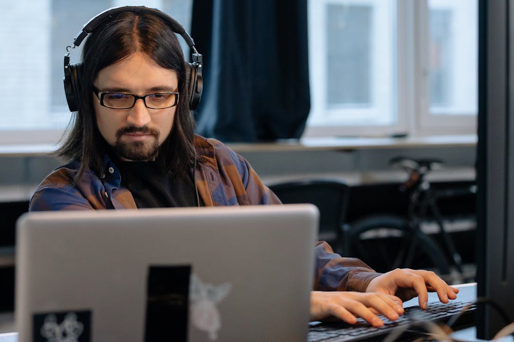 An MSP technician working at his computer.