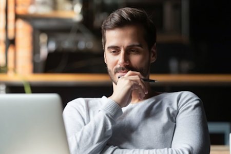 Man enjoying Splashtop's remote desktop on his laptop, post switch from LogMeIn
