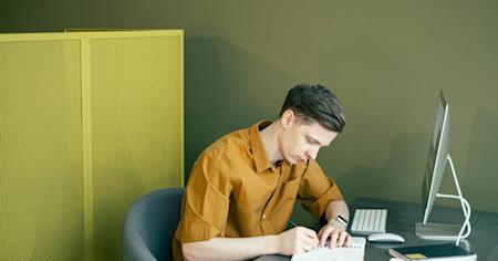 A person working at his desk.