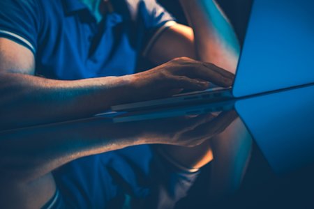 A man using desktop as a service (DaaS) for remote work.