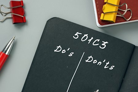 Close up view of notebook with 501c3 tax exempt