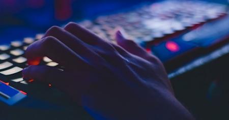 Close up of person typing on keyboard