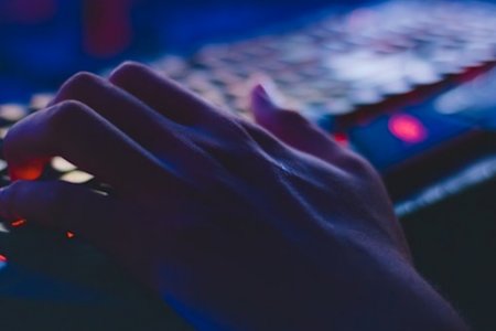 Close up of person typing on keyboard