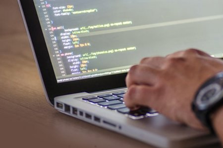 Technician connecting into student's computer to debug an issue