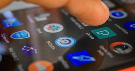 An android device being remotely accessed by an iPad.