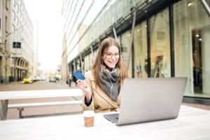 A woman on a laptop using Splashtop, the top program like TeamViewer