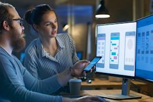 UX Designers using Splashtop remote desktop to access wire frame drawings