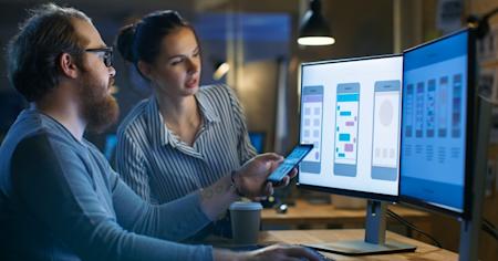UX Designers using Splashtop remote desktop to access wire frame drawings