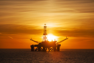 File photo - Offshore installation in the middle of the ocean at sunset time