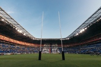 A snapshot taken on the green of a Rugby stadium in France from behind the goalposts