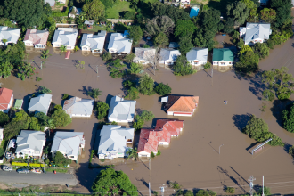 Aerial view of houses getting flooded 