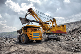 Trucks - Loading of iron ore on very big dump-body truck HDR