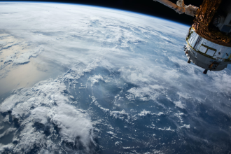 Clouds over the ocean viewed from space photographed from within a NASA vessel