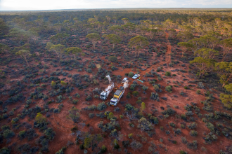 Aerial of an exploration drill rig in the red dirt of Kalgoorlie, Western Australia. (2)