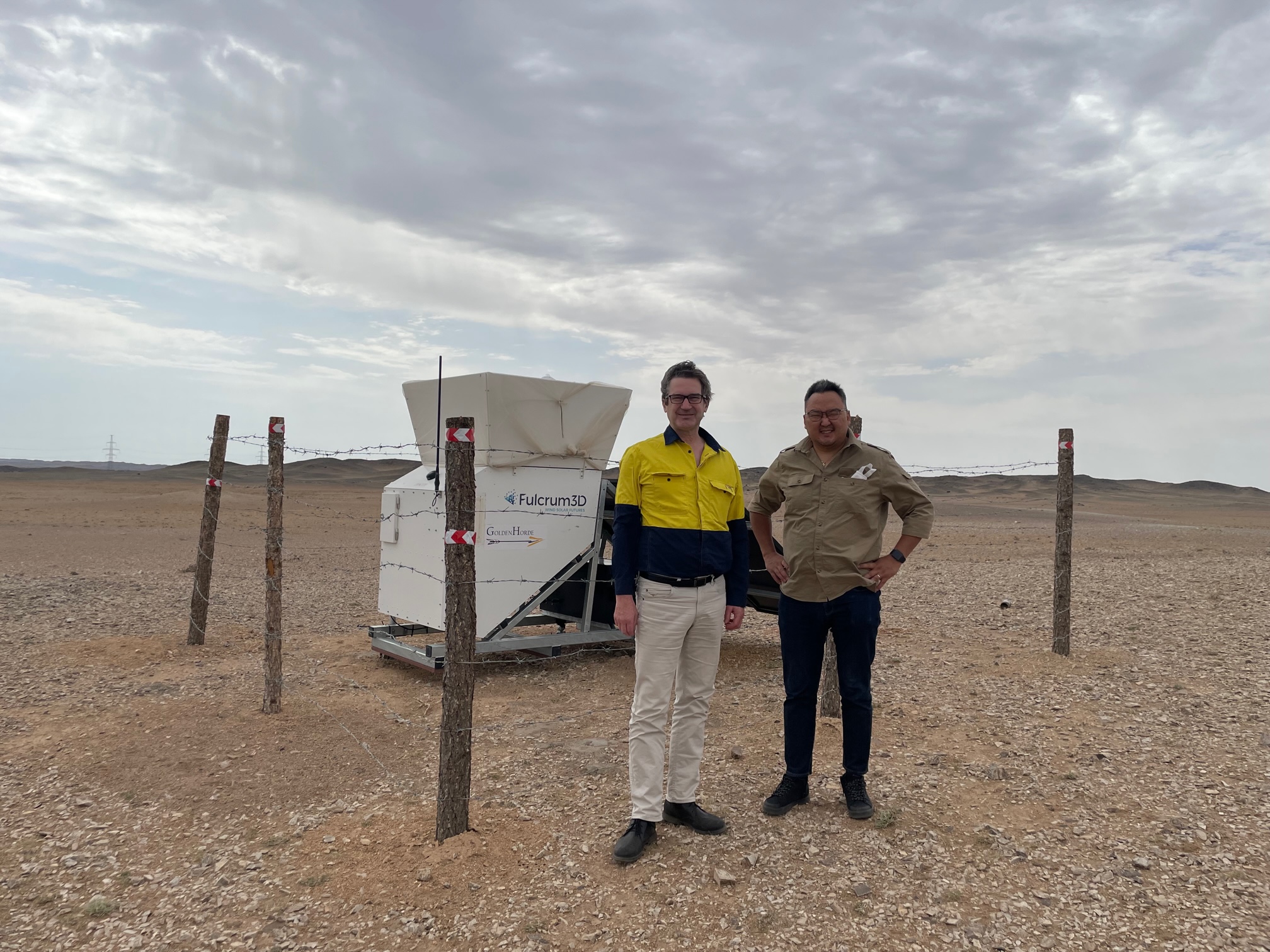 Elixir Energy MD Neil Young (left) stands alongside a colleague on-site the Nomgon IX CBM project