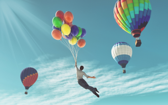 An image depicting a man, holding helium balloons, rising into the sky towards a group of hot air balloons 