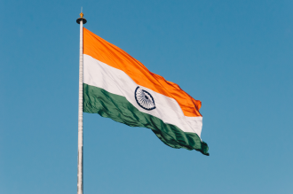 Pictured: the Indian flag flies atop a pole 