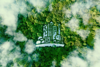 Green city in a lush forest background